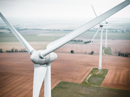 Three white wind turbines