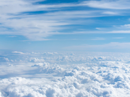 Above-cloud photo of blue skies